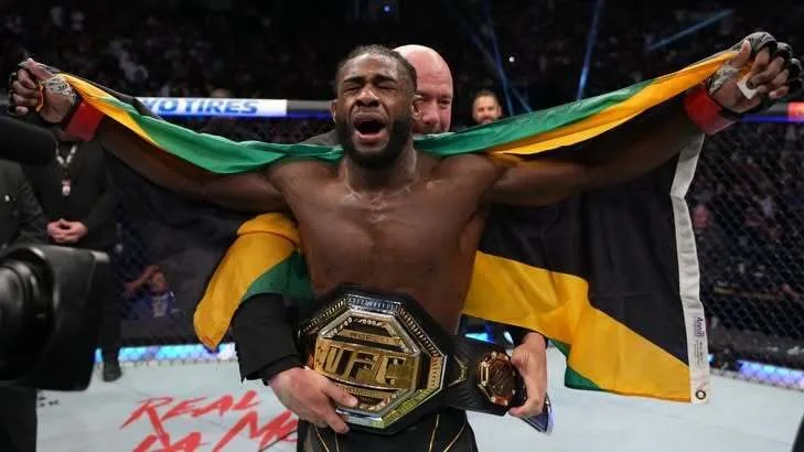 Aljamain Sterling celebrating with the Jamaican flag